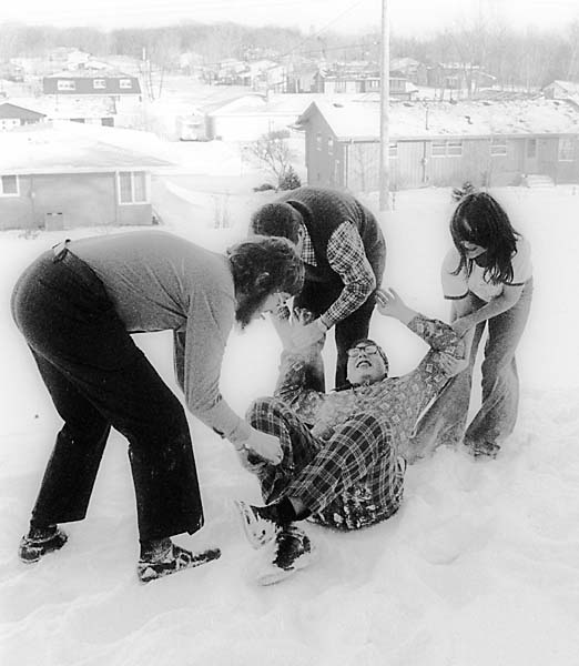 John Stanley, (?? on ground), (?? face obscured), Erica Stark 