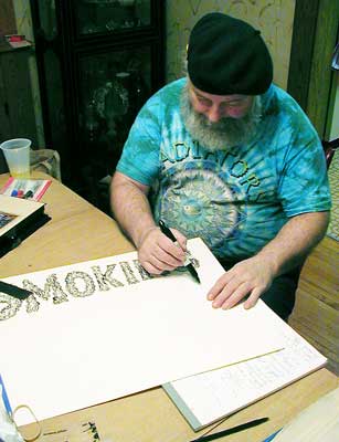 Richard making signs 