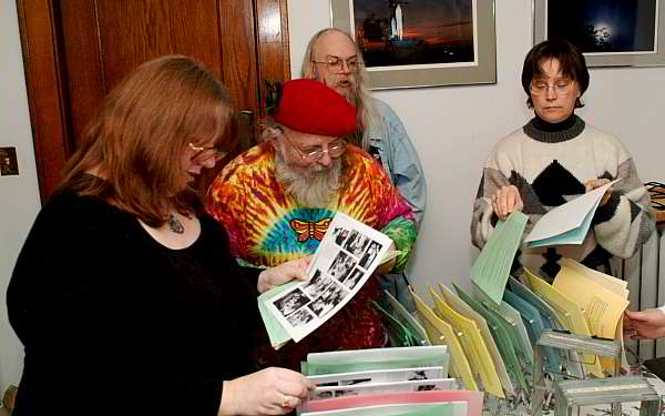 Geri Sullivan, Richard Tatge, Dean Gahlon, Karen Cooper collating