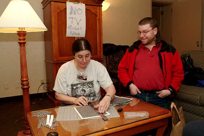 Cally cutting out stickers, and Aahz