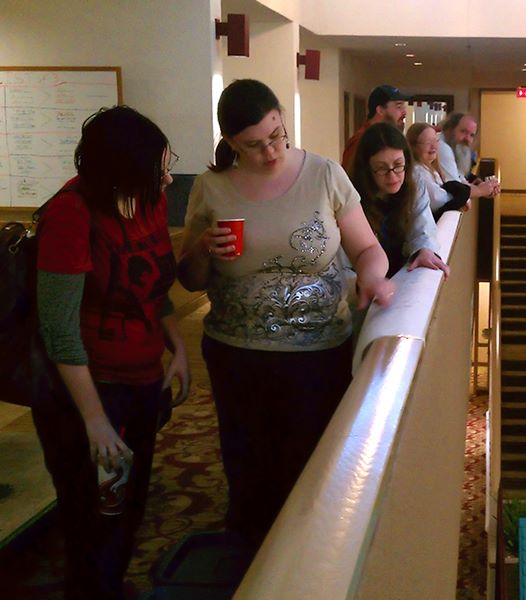 Fans examine the Mega Money Duck results