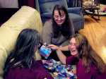 Irene, Katie picking over quilt squares 