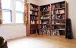 Library, mostly denuded of books