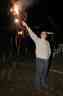 Dr. Dan enjoying a sparkler at Neil's bonfire